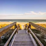 A Touch Of Paradise. Oceanfront Views, Communal Bbqs, And A Pool